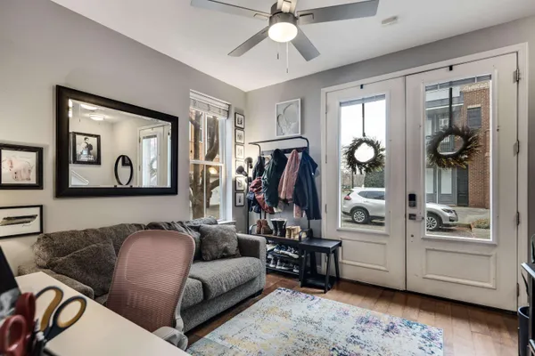 a living room with furniture and a window