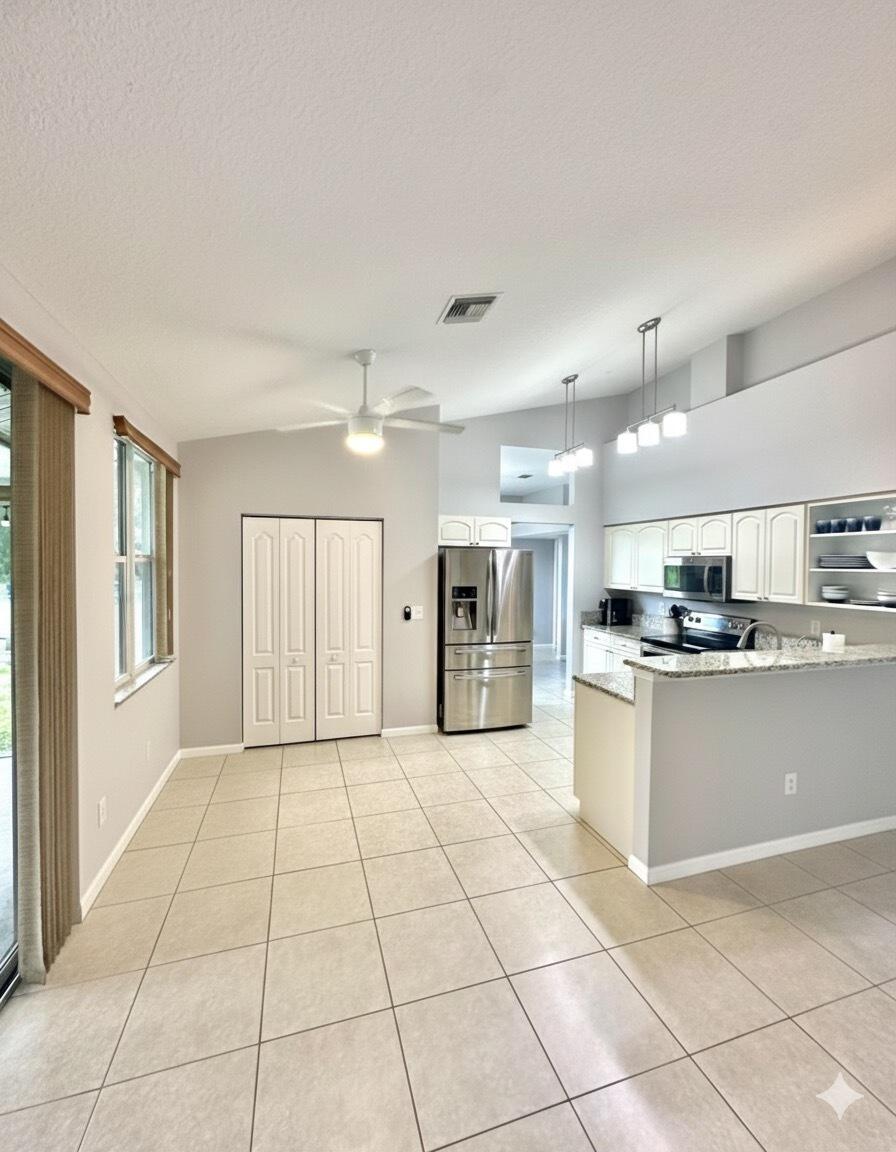 13218 86th Road North West Palm Beach, FL 33412 - Photo 11 of 69 A.I staged kitchen view