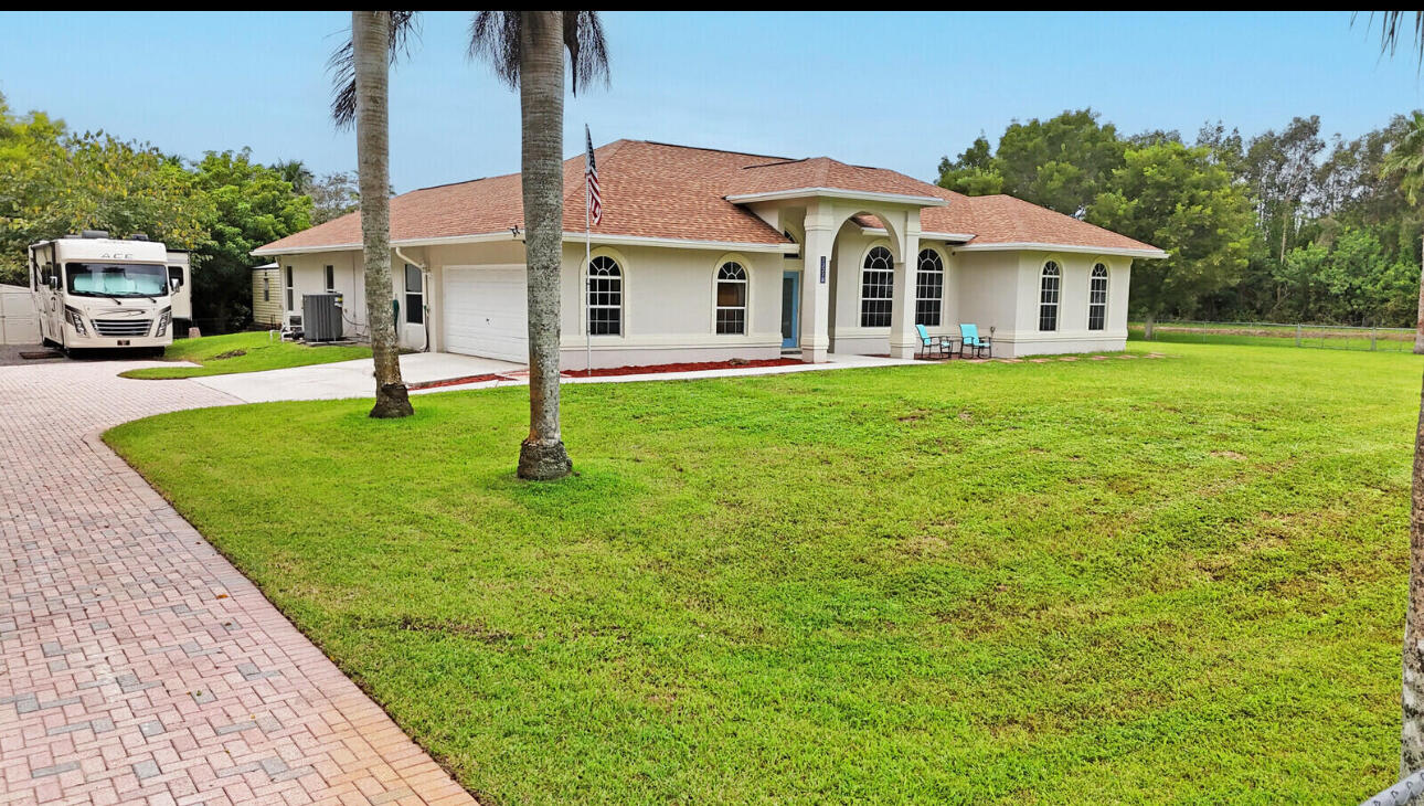 13218 86th Road North West Palm Beach, FL 33412 - Photo 64 of 69 Driveway pathway