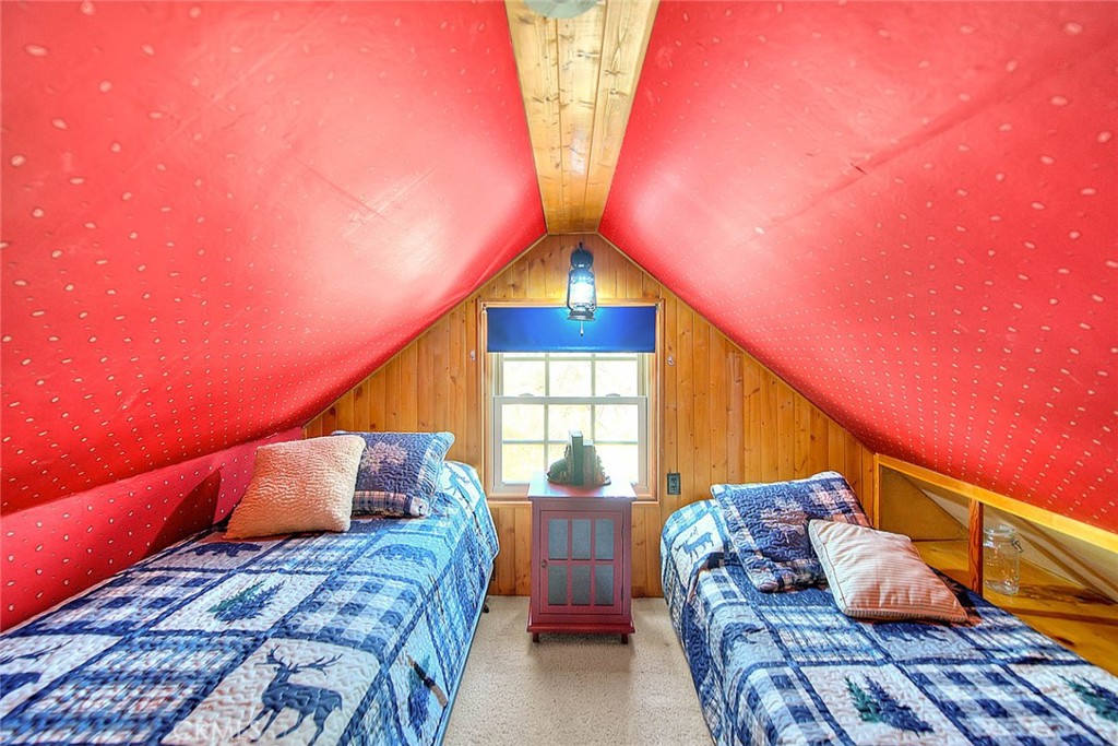 5926 Pine Street Wrightwood, CA 92397 - Photo 26 of 66 a bedroom with two beds and a potted plant