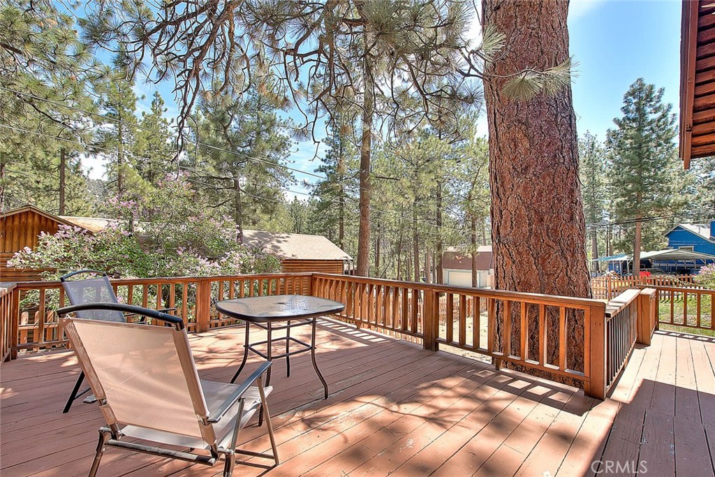 5926 Pine Street Wrightwood, CA 92397 - Photo 33 of 66 a view of a chairs and table on the wooden floor