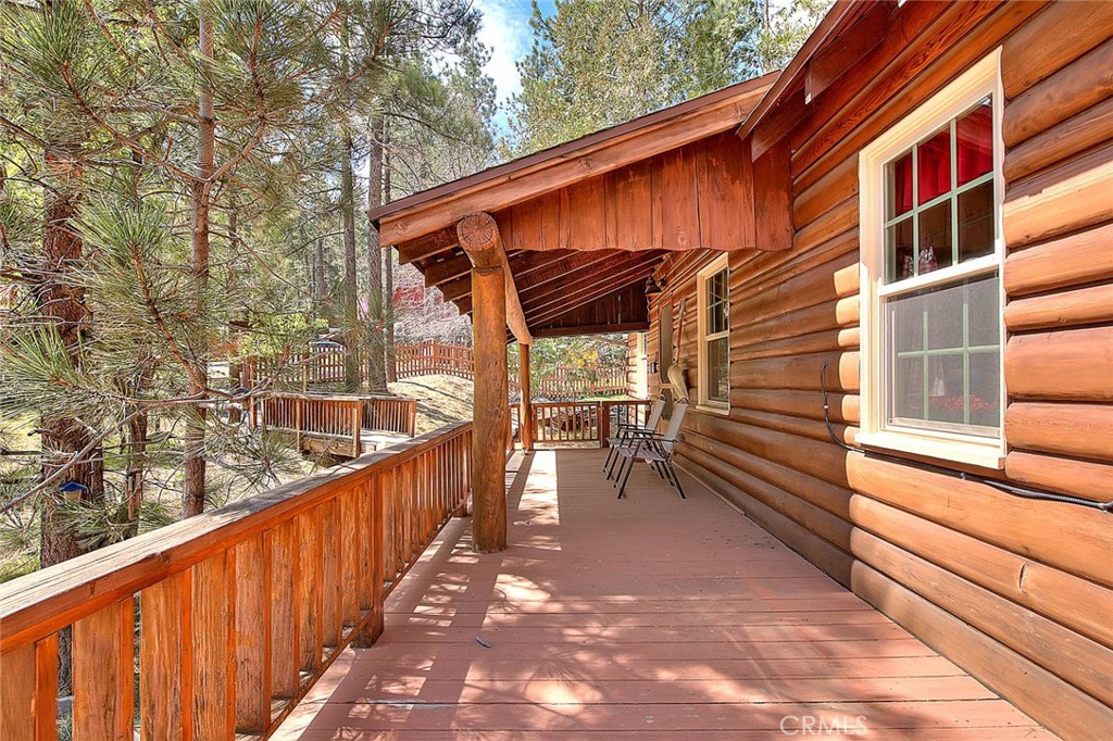 5926 Pine Street Wrightwood, CA 92397 - Photo 37 of 66 a view of a house with backyard and wooden fence
