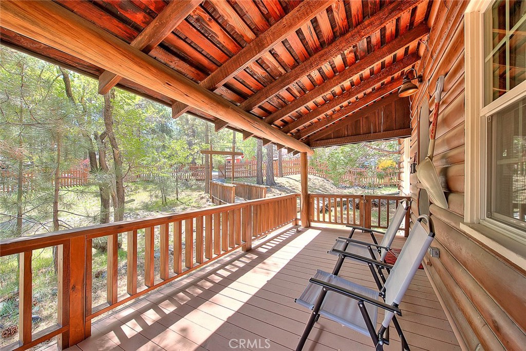 5926 Pine Street Wrightwood, CA 92397 - Photo 38 of 66 a view of a two chairs in the balcony