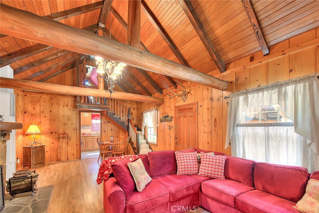 5926 Pine Street Wrightwood, CA 92397 - Photo 45 of 66 a blue couch sitting in front of a building