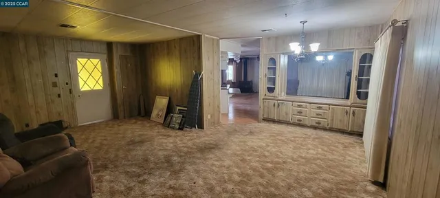 a kitchen with a stove and a refrigerator