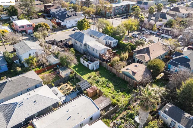 an aerial view of a city with lots of residential buildings