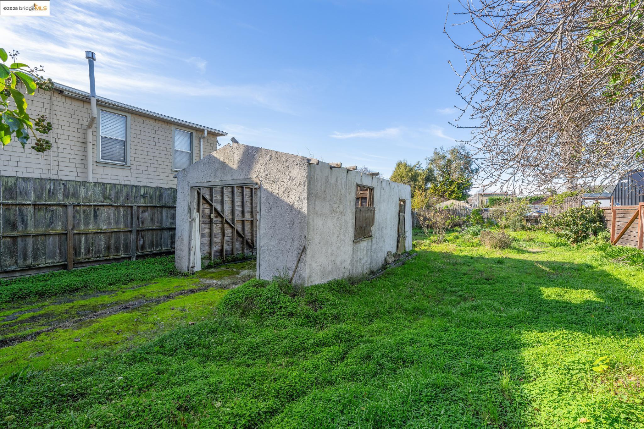 3032 Mabel Street Berkeley, CA 94702 - Photo 8 of 25 a view of a backyard with a small cabin