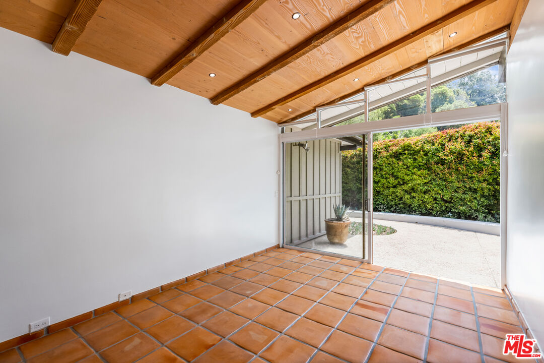 1776 Old Ranch Road Los Angeles, CA 90049 - Photo 15 of 24 a view of a room with a large window
