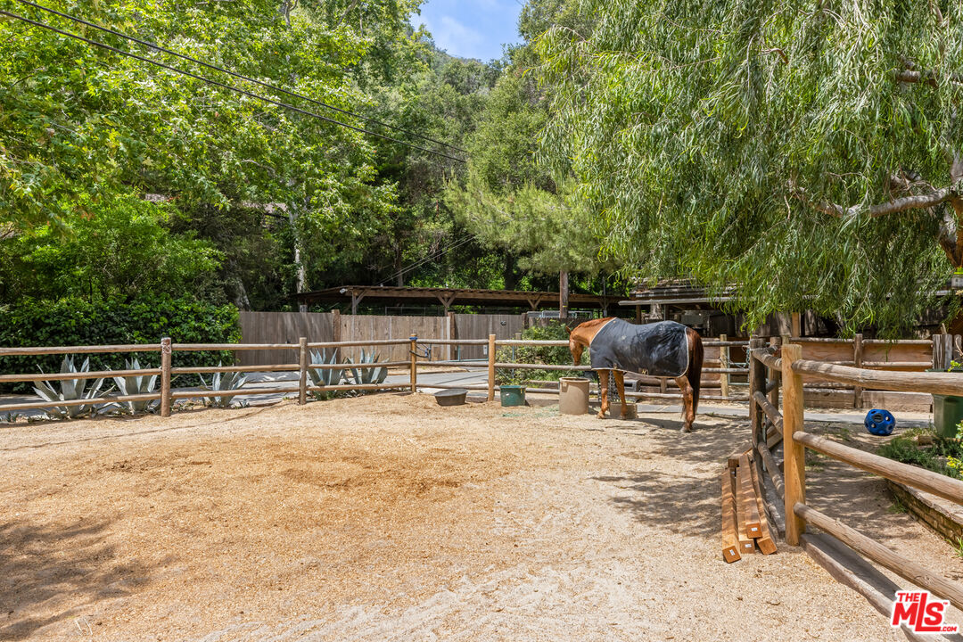 1776 Old Ranch Road Los Angeles, CA 90049 - Photo 22 of 24 a view of a terrace with chairs