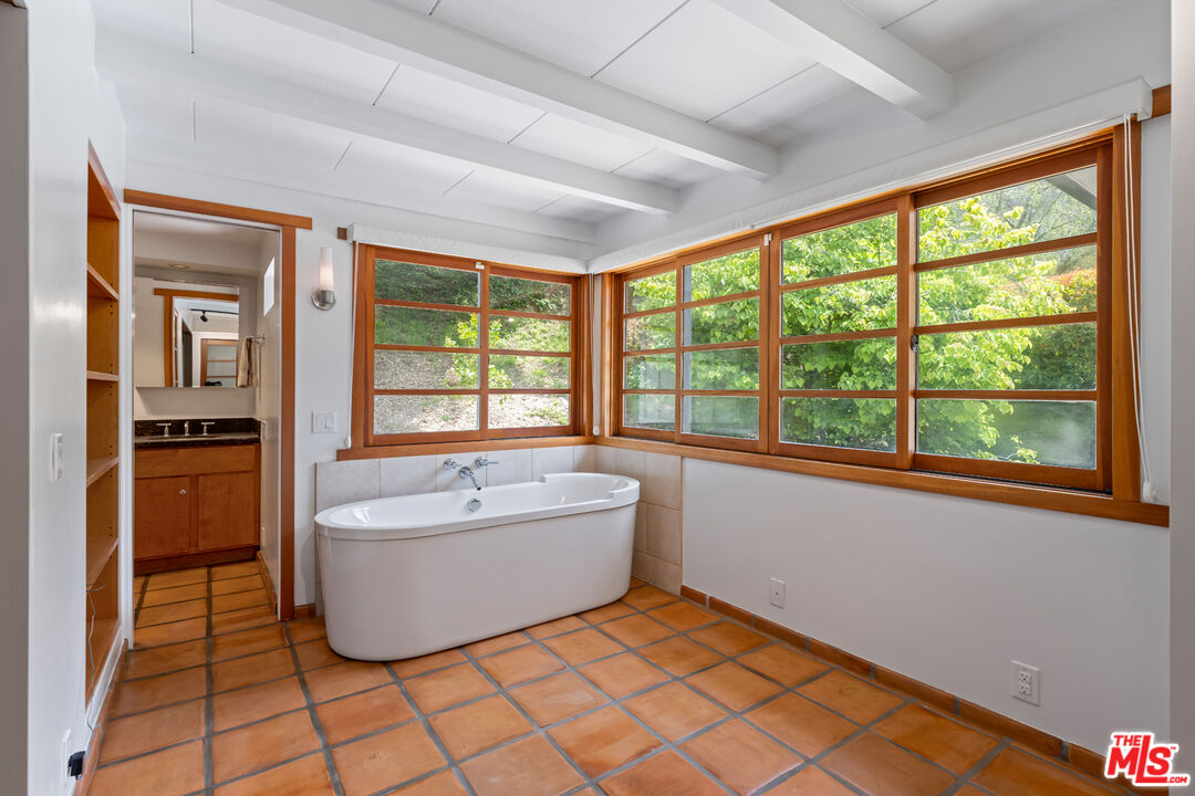 1776 Old Ranch Road Los Angeles, CA 90049 - Photo 10 of 24 a living room with a large window