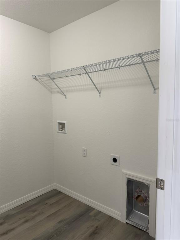 9545 North Travis Drive, Unit A Citrus Springs, FL 34434 - Photo 13 of 15 a view of a room with racks on the wall