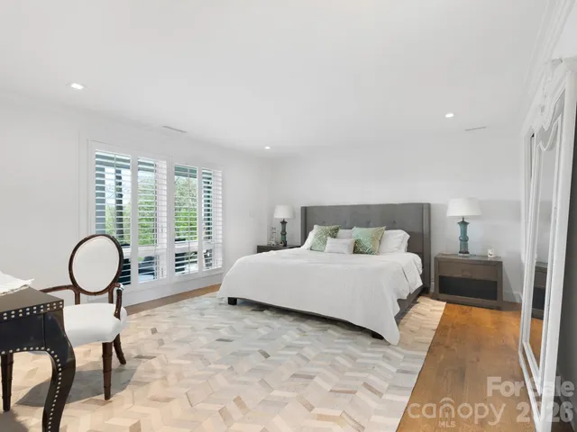 a view of a park with large trees