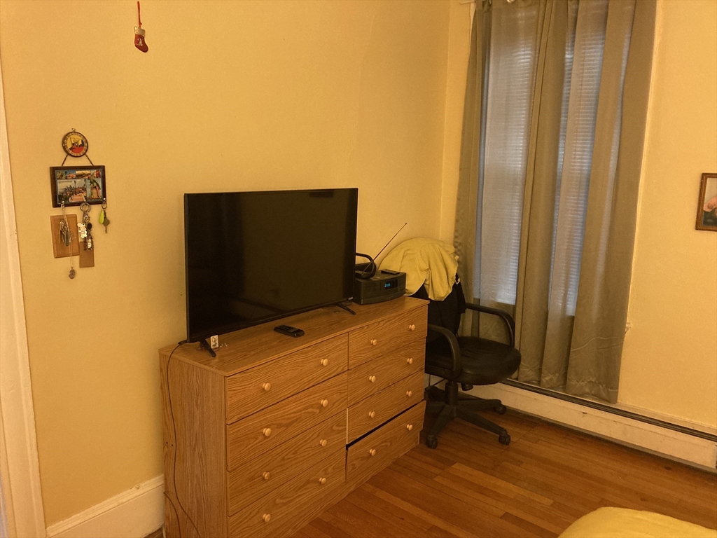 1734 Commonwealth Avenue, Unit 4 Boston, MA 02135 - Photo 8 of 15 a room with storage and utility