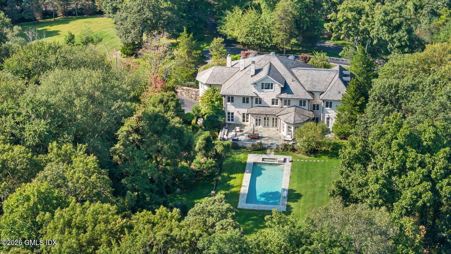 44 Hunting Ridge Road Greenwich, CT 06831 - Photo 28 of 30 an aerial view of a house with a yard
