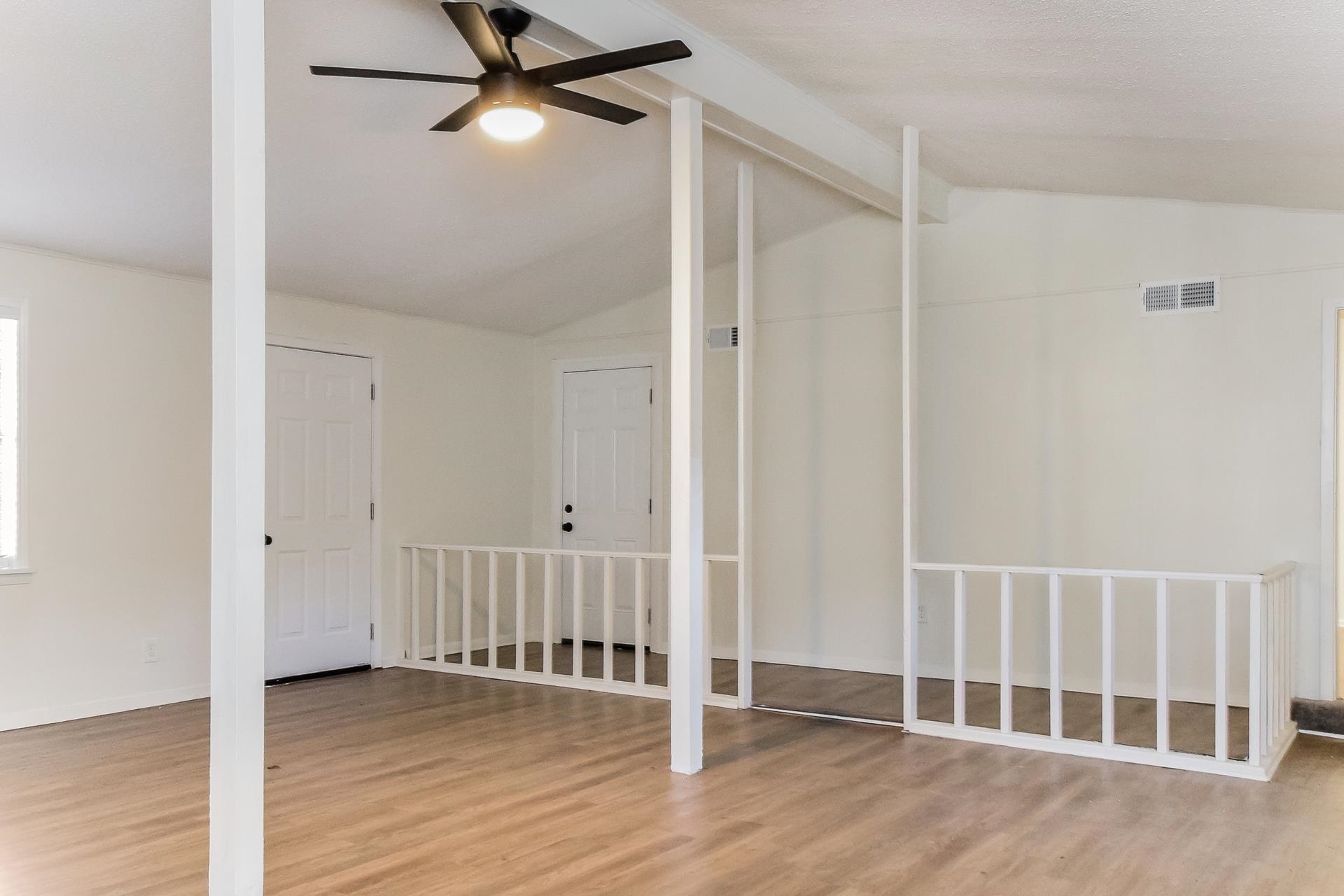 2966 Knight Road Memphis, TN 38118 - Photo 2 of 19 a view of an empty room with wooden floor