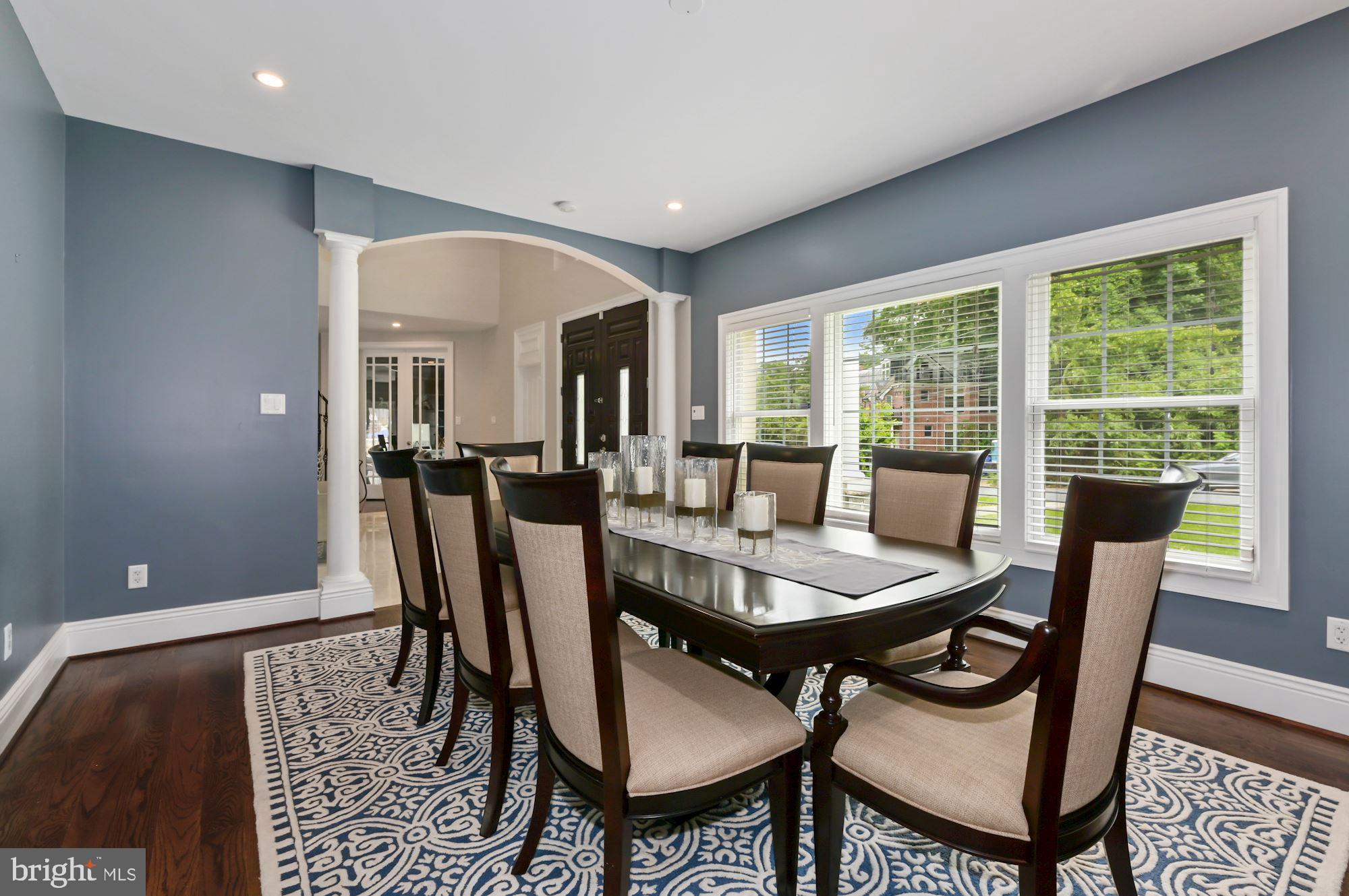 6005 Selvyn Road Bethesda, MD 20817 - Photo 14 of 65 Formal Dining Room w/ Large Windows to Front Yard