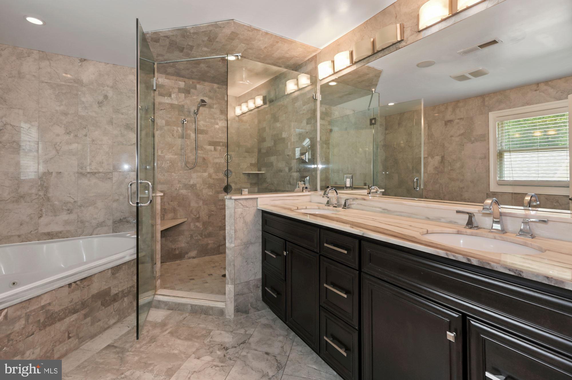 6005 Selvyn Road Bethesda, MD 20817 - Photo 34 of 65 Owner's Suite Bathroom w/ Shower + Bathtub