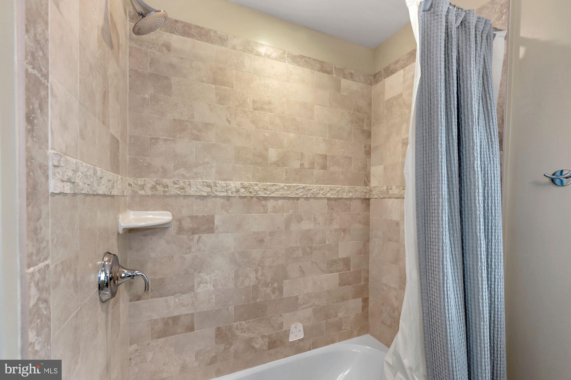 6005 Selvyn Road Bethesda, MD 20817 - Photo 43 of 65 Bathtub + Tiled Shower