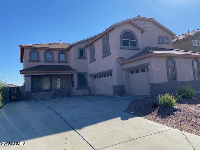 21801 Backus Drive Maricopa, AZ 85138 - Photo 1 of 22 a view of a house with a yard