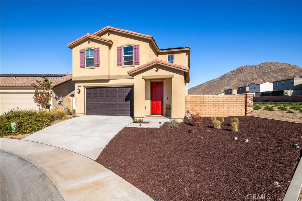 20132 Sunburst Court Riverside, CA 92507 - Photo 1 of 1 a front view of a house with a yard