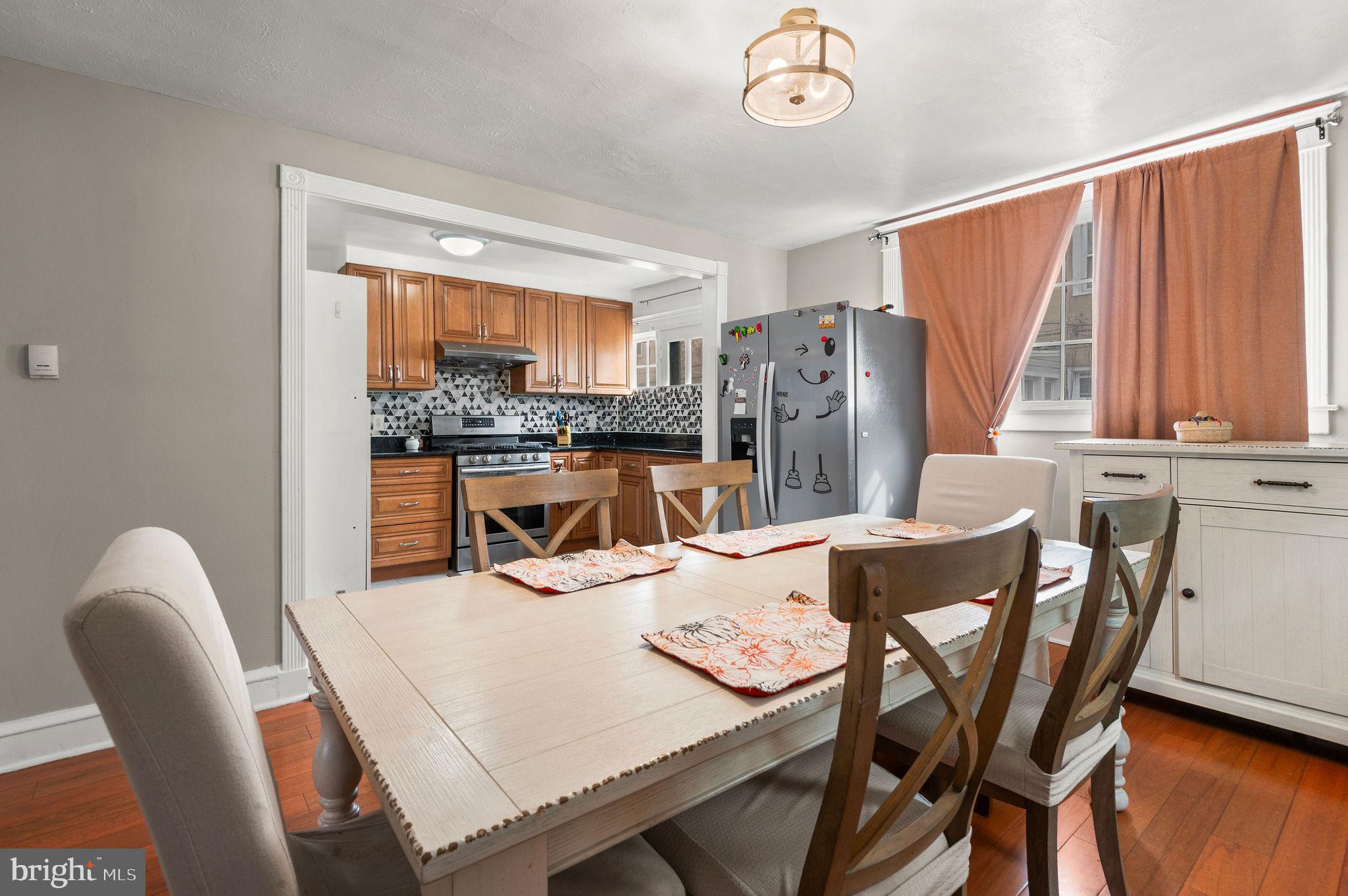 227 Shirley Road Upper Darby, PA 19082 - Photo 11 of 25 a view of a dining room with furniture window and outside view