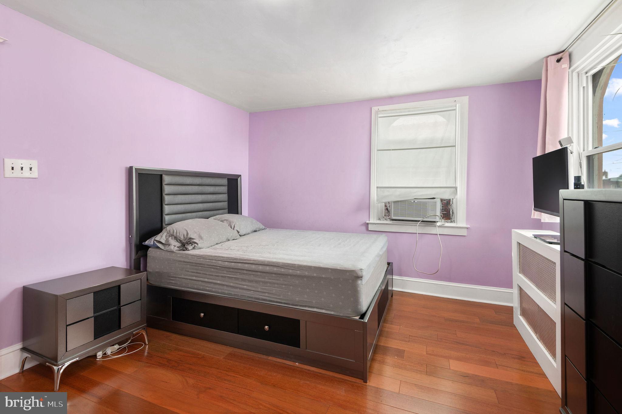 227 Shirley Road Upper Darby, PA 19082 - Photo 22 of 25 a bedroom with a bed and a window