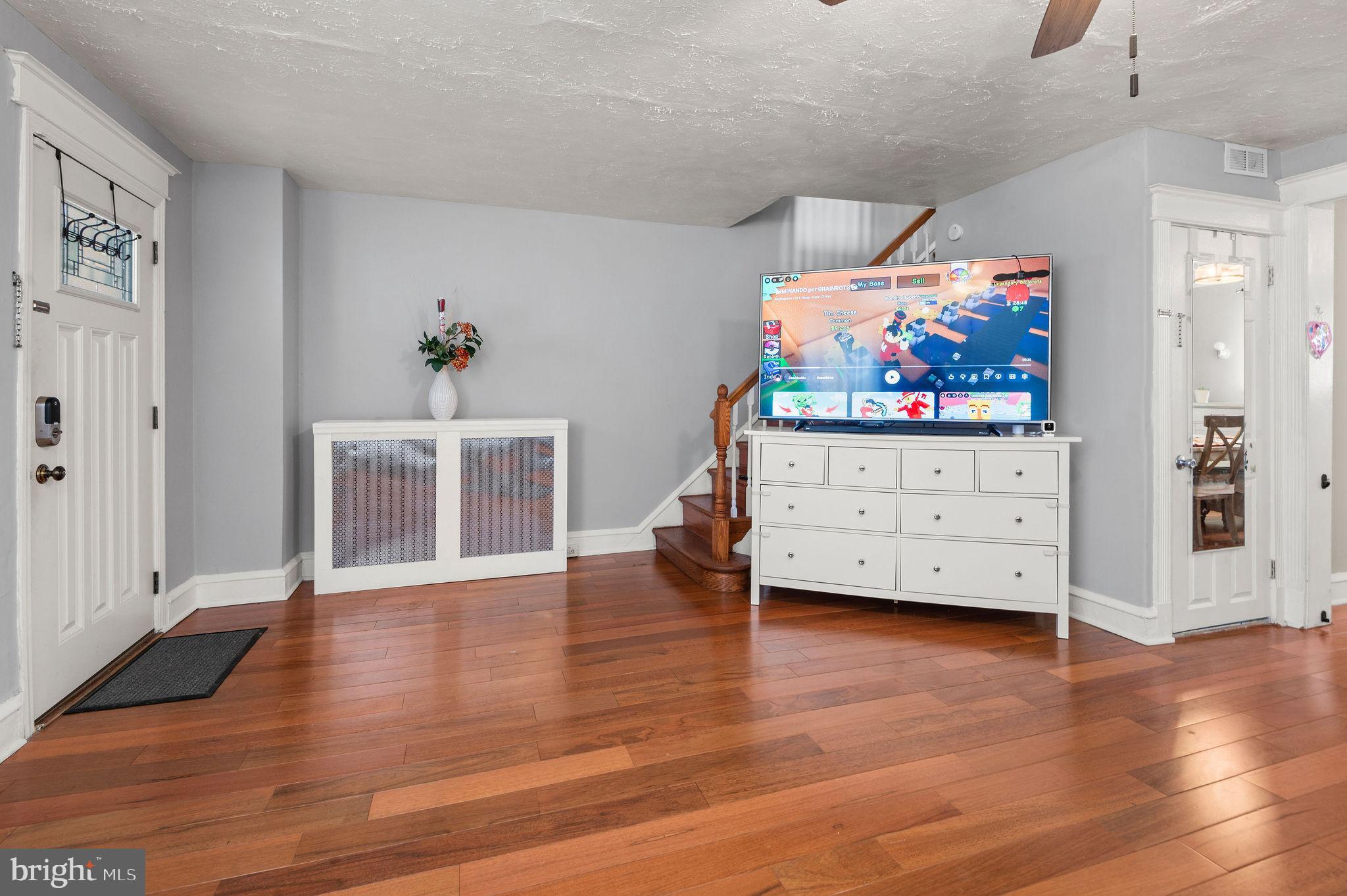227 Shirley Road Upper Darby, PA 19082 - Photo 7 of 25 a view of a livingroom with wooden floor