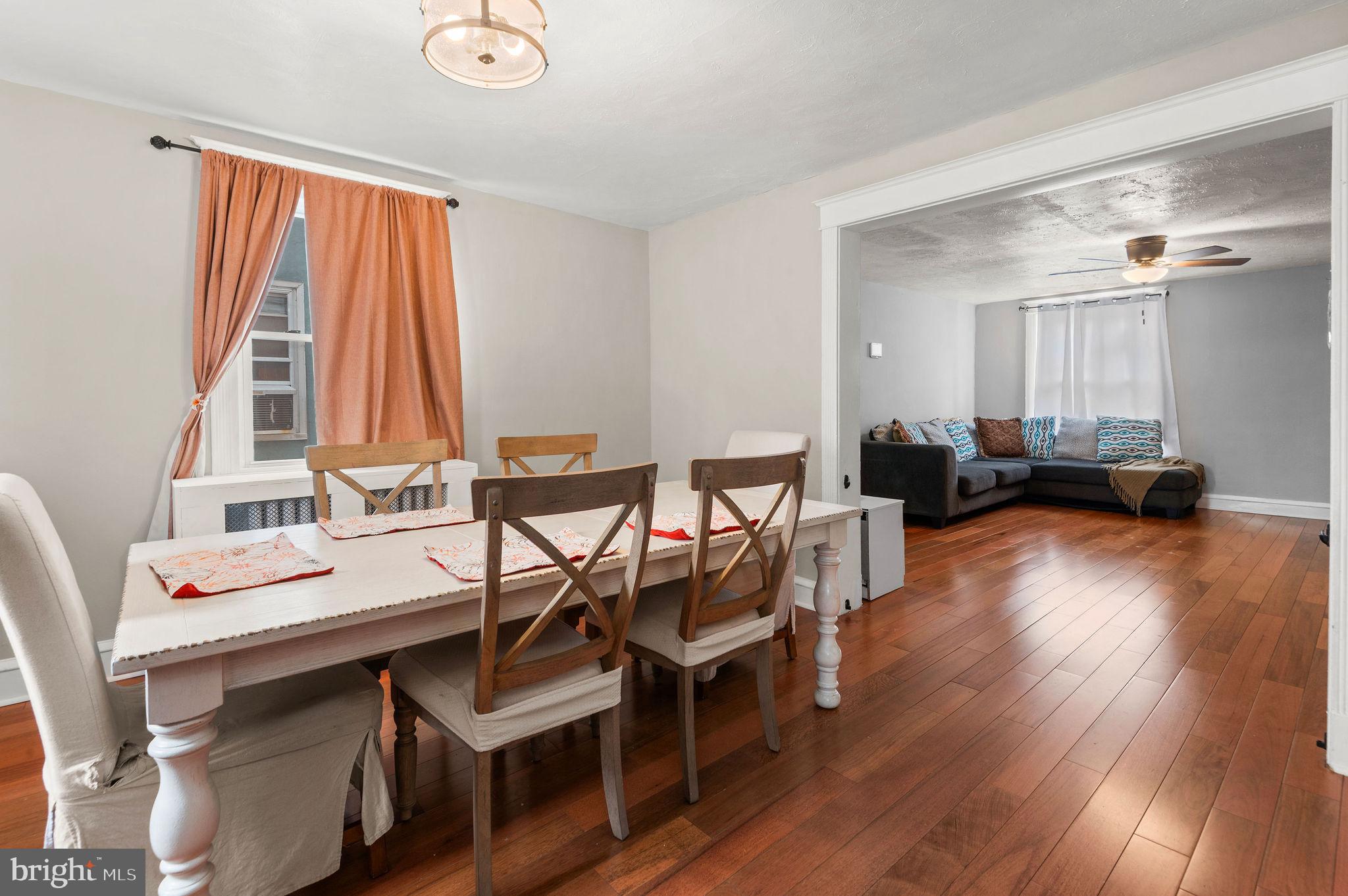 227 Shirley Road Upper Darby, PA 19082 - Photo 9 of 25 a dining room with furniture and wooden floor