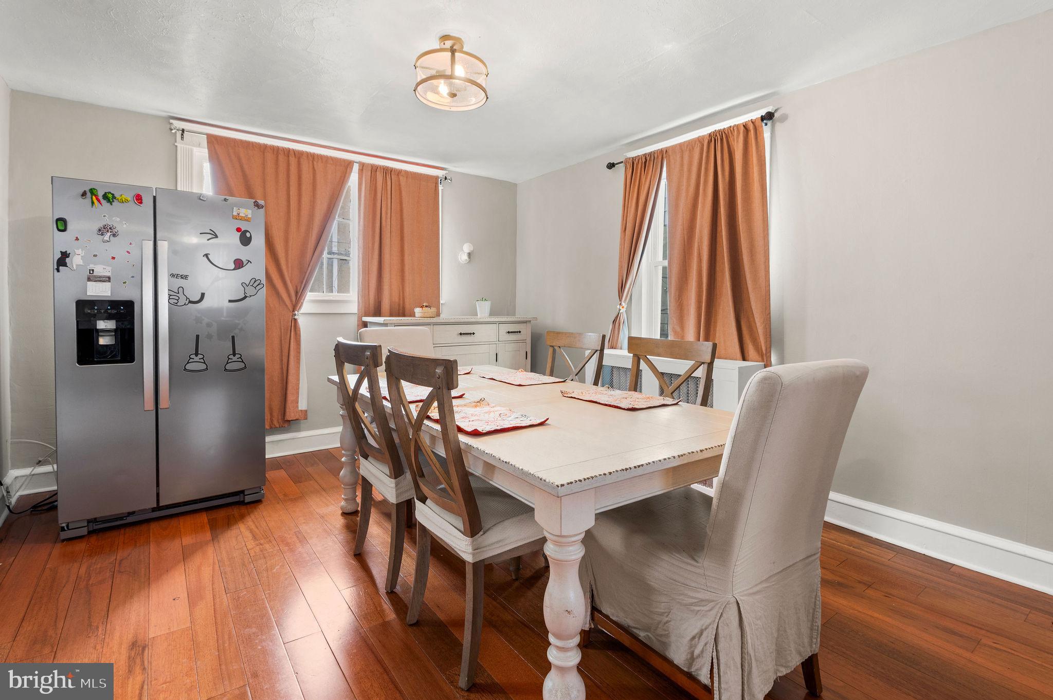 227 Shirley Road Upper Darby, PA 19082 - Photo 10 of 25 a view of a dining room with furniture window and wooden floor