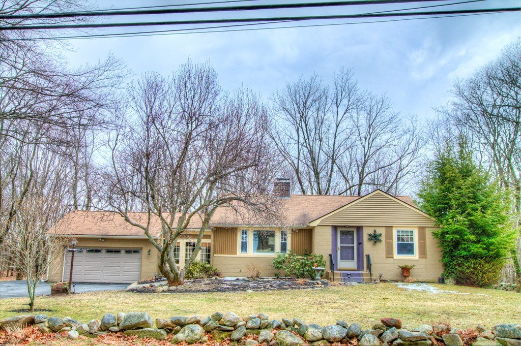 24 Hall Road Chelmsford, MA 01824 - Photo 1 of 30 a front view of a house with garden