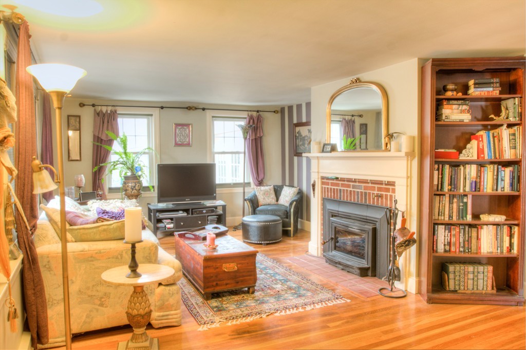 24 Hall Road Chelmsford, MA 01824 - Photo 15 of 30 a living room with fireplace furniture and a fireplace