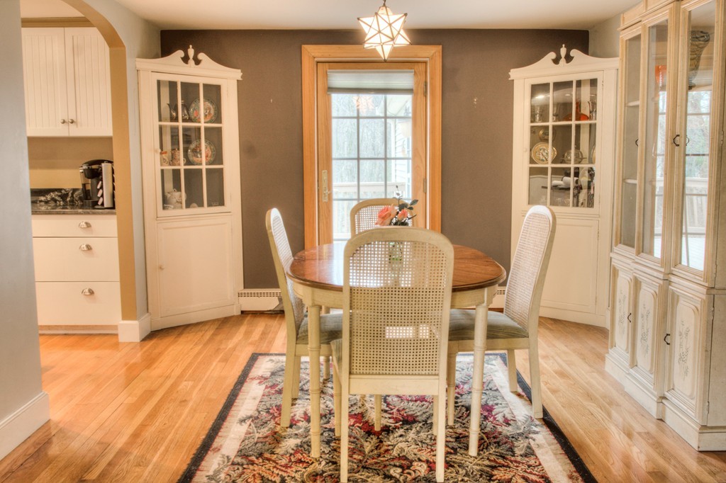 24 Hall Road Chelmsford, MA 01824 - Photo 18 of 30 a view of a dining room with furniture wooden floor and windows