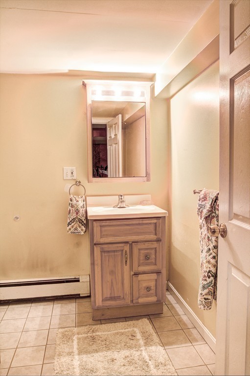 24 Hall Road Chelmsford, MA 01824 - Photo 21 of 30 a bathroom with a granite countertop sink a mirror and a shower