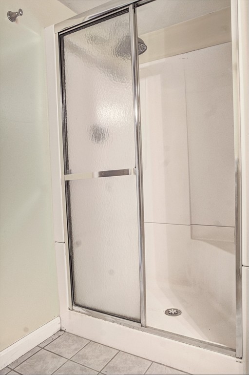 24 Hall Road Chelmsford, MA 01824 - Photo 24 of 30 a bathroom with a glass shower door