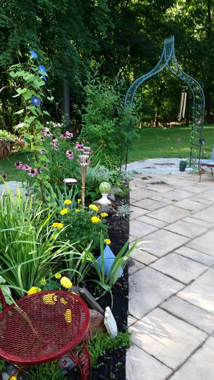 24 Hall Road Chelmsford, MA 01824 - Photo 29 of 30 a backyard of a house with lots of green space and outdoor seating