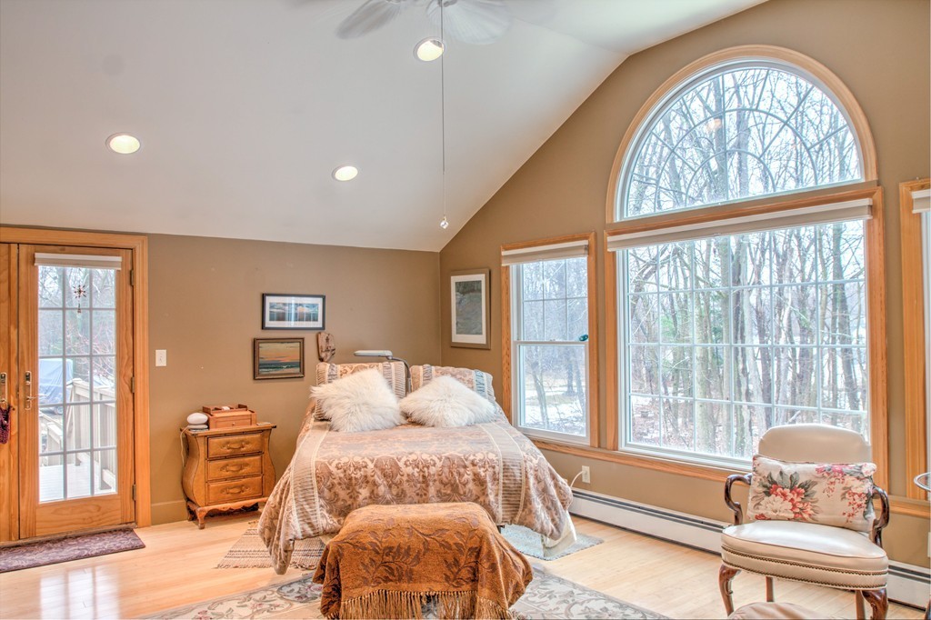 24 Hall Road Chelmsford, MA 01824 - Photo 4 of 30 a bedroom with furniture and a large window