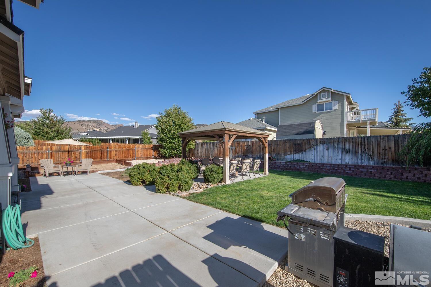 740 Silver Run Drive Reno, NV 89521 - Photo 31 of 36 a front view of a house with garden