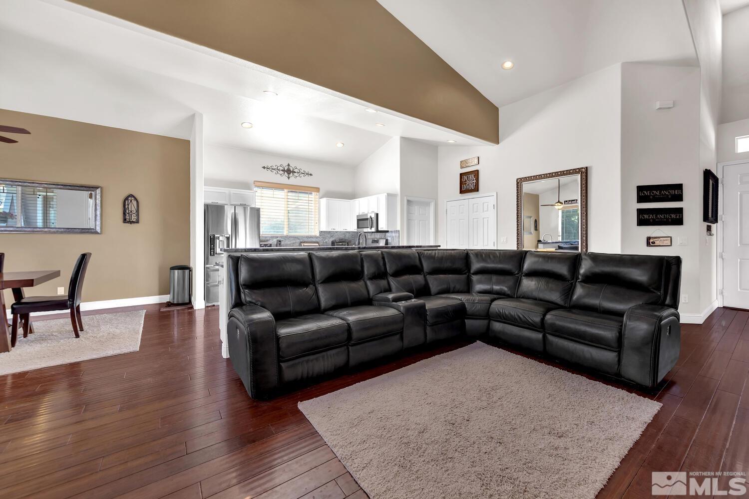 740 Silver Run Drive Reno, NV 89521 - Photo 5 of 36 a living room with furniture and a wooden floor