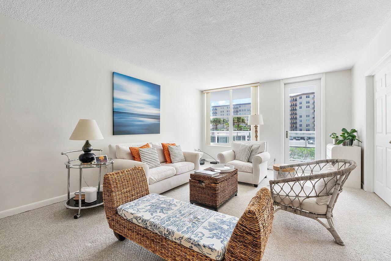 3450 South Ocean Boulevard, Unit 118 Palm Beach, FL 33480 - Photo 17 of 39 a living room with furniture and a window