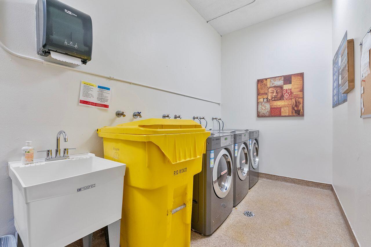 3450 South Ocean Boulevard, Unit 118 Palm Beach, FL 33480 - Photo 22 of 39 a utility room with dryer and washer