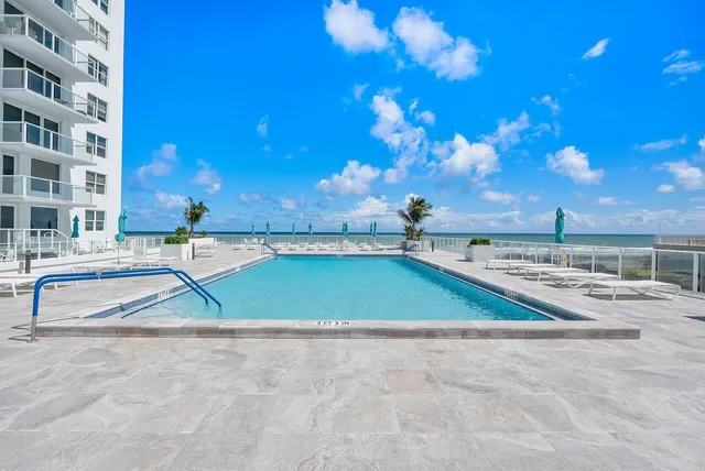 a view of pool and outdoor space