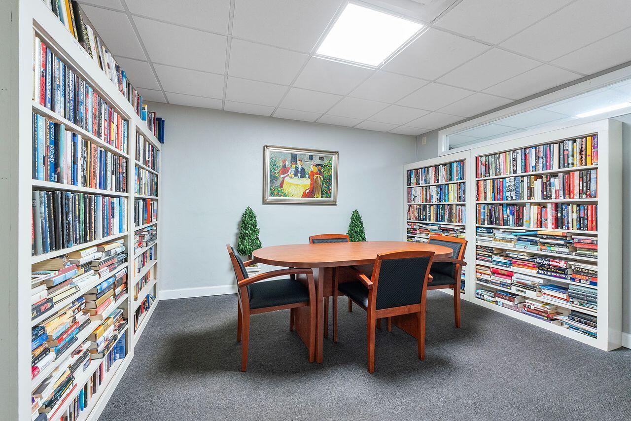 3450 South Ocean Boulevard, Unit 118 Palm Beach, FL 33480 - Photo 30 of 39 a view of a workspace with furniture and toys