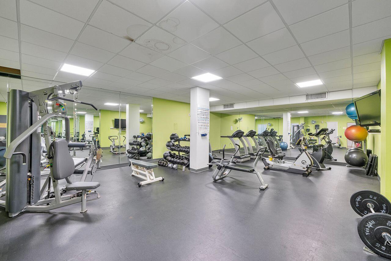 3450 South Ocean Boulevard, Unit 118 Palm Beach, FL 33480 - Photo 3 of 39 a view of a room with gym equipment