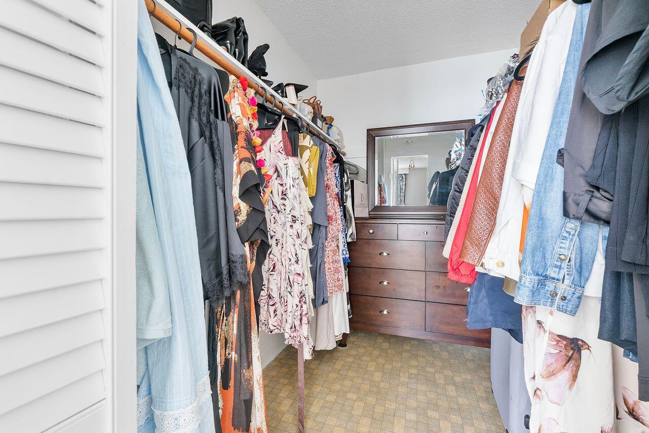 3450 South Ocean Boulevard, Unit 118 Palm Beach, FL 33480 - Photo 8 of 39 a view of walk in closet with clothes