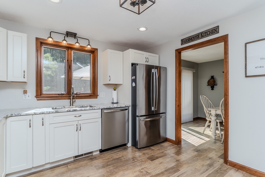 2 Gulf Road Pelham, MA 01002 - Photo 23 of 38 a kitchen with stainless steel appliances a refrigerator sink and cabinets