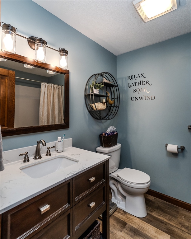 2 Gulf Road Pelham, MA 01002 - Photo 25 of 38 a bathroom with a toilet a sink and mirror