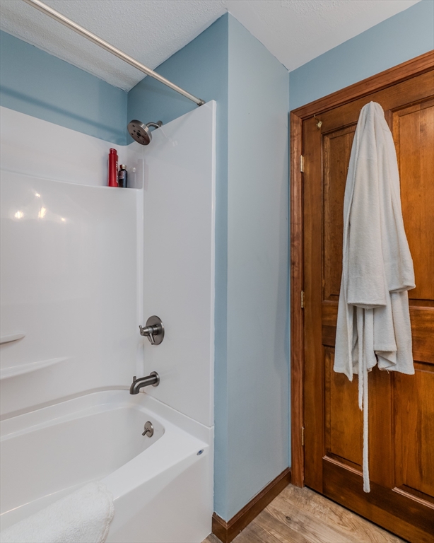 2 Gulf Road Pelham, MA 01002 - Photo 27 of 38 a bathroom with a bathtub and a shower