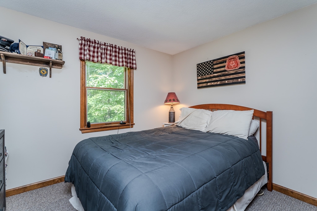 2 Gulf Road Pelham, MA 01002 - Photo 33 of 38 a bedroom with a bed and a window