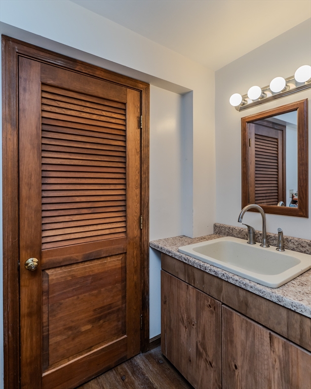 2 Gulf Road Pelham, MA 01002 - Photo 36 of 38 a bathroom with a sink and a mirror