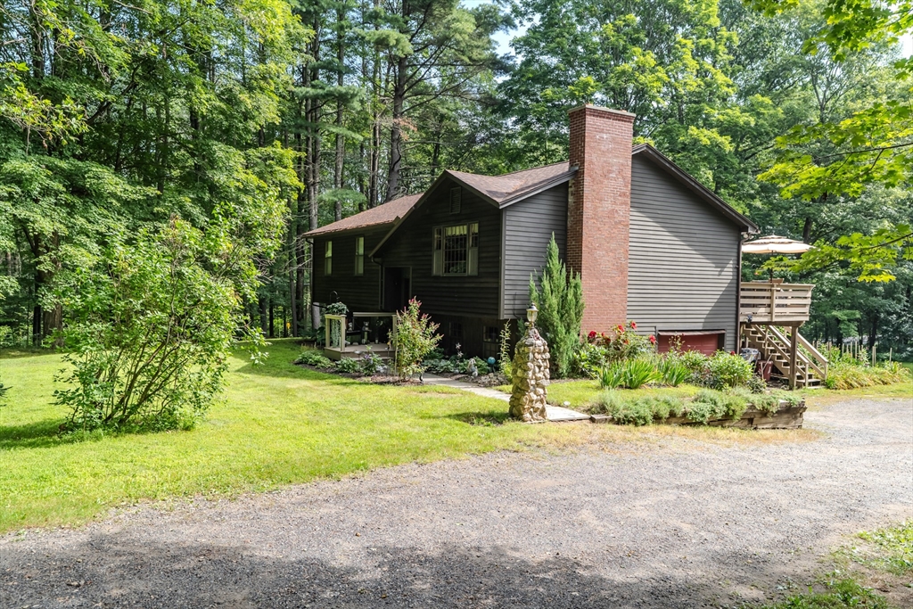 2 Gulf Road Pelham, MA 01002 - Photo 4 of 38 a view of a house with backyard and garden